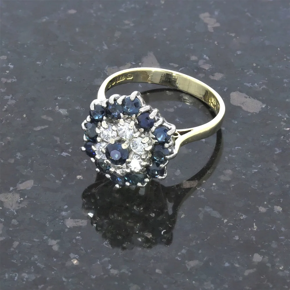Pre Owned 18ct Yellow Gold Sapphire And 0.25cts Diamond Cluster Ring