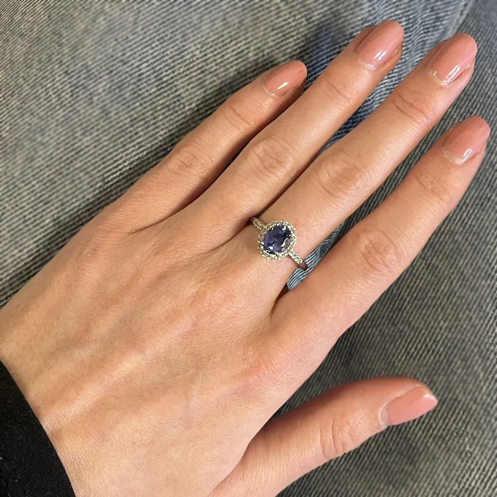 Pre Owned 9ct White Gold Oval Tanzanite and 0.20cts Diamond Halo Cluster Ring