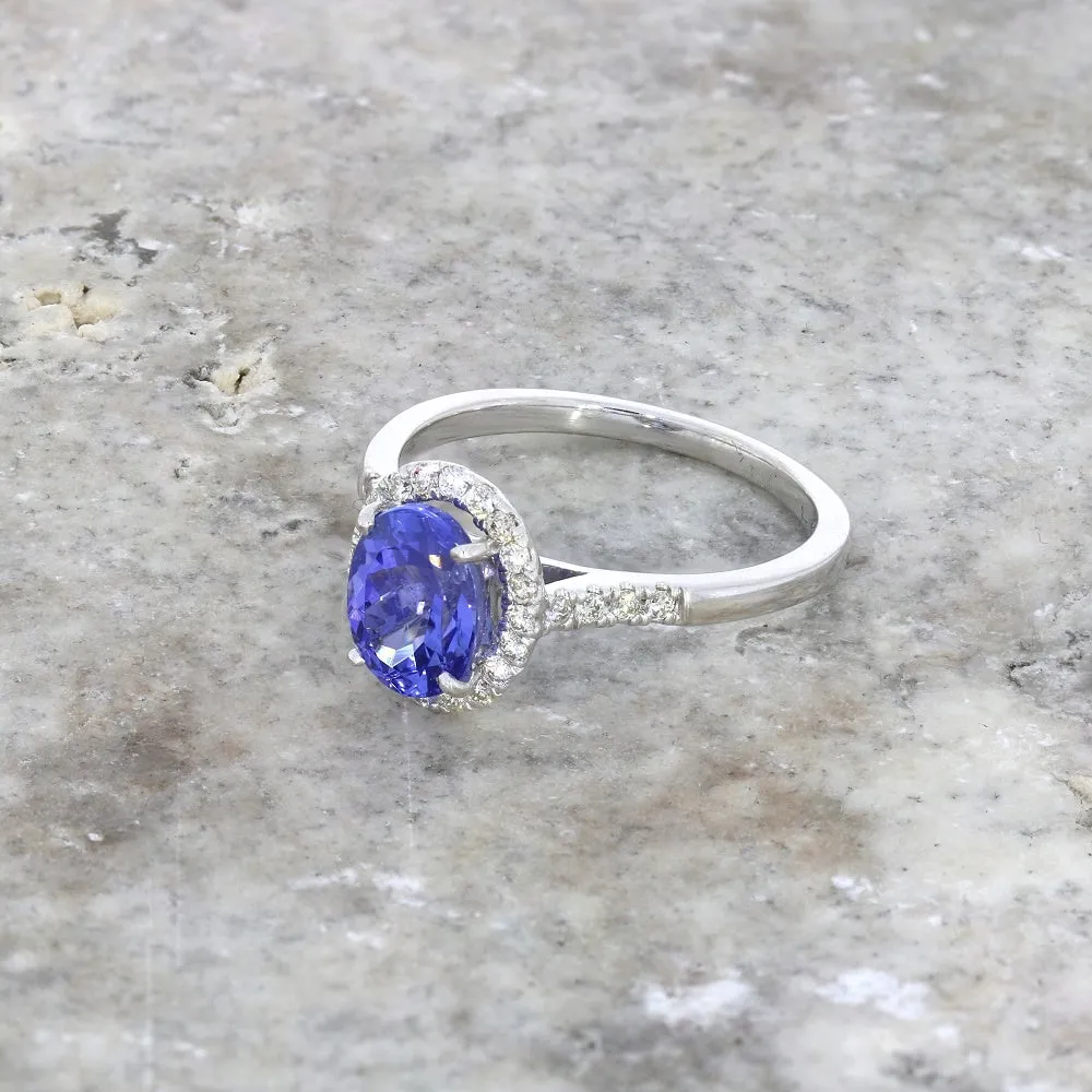 Pre Owned 9ct White Gold Oval Tanzanite and 0.20cts Diamond Halo Cluster Ring