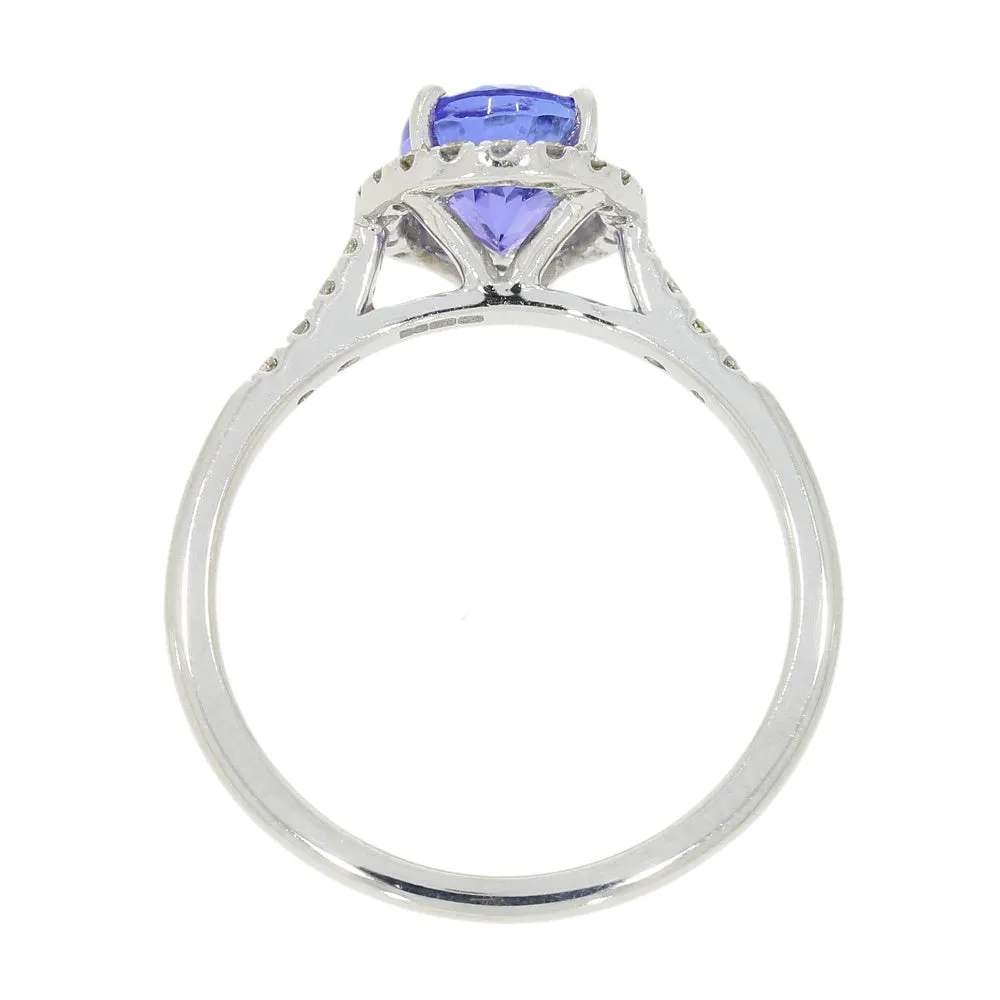 Pre Owned 9ct White Gold Oval Tanzanite and 0.20cts Diamond Halo Cluster Ring