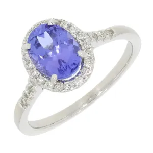 Pre Owned 9ct White Gold Oval Tanzanite and 0.20cts Diamond Halo Cluster Ring